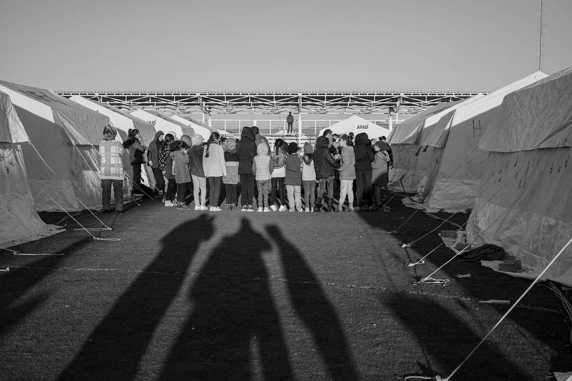 Refugees in eastern Chad receiving medical care in an overcrowded displacement camp